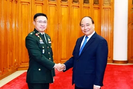 Thủ tướng Nguyễn Xuân Phúc tiếp Đại tướng Surapong Suwana Adth, Tư lệnh lực lượng Quốc phòng Quân đội Hoàng gia Thái Lan. (Ảnh: Thống Nhất/TTXVN)
