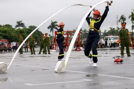 Sự phối hợp nhịp nhàng, ăn ý giữa các thành viên trong đội rất quan trọng. (Ảnh: Doãn Đức/Vietnam+)