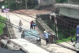 Chủ tịch Ủy ban nhân dân thành phố Hà Nội đề nghị xử lý nghiêm vụ thu phí trái phép tại cây cầu tạm phục vụ công trình. (Ảnh: PV/Vietnam+)