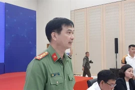 Đại tá Trịnh Ngọc Quyên, Giám đốc Công an tỉnh Bình Dương phát biểu tại buổi họp báo. (Ảnh: Chí Tưởng/TTXVN)