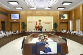 Phiên họp thứ 15 của Uỷ ban Thường vụ Quốc hội. (Ảnh: Doãn Tấn/TTXVN)