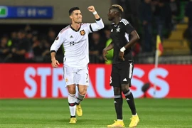 Cristiano Ronaldo (trái) trong trận đấu tại Giải UEFA Europa League ở Chisinau, Moldova, ngày 15/9. (Ảnh: AFP/TTXVN)