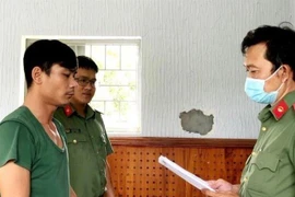 Đối tượng Nguyễn Đình Chiến tại Cơ quan công an. (Ảnh: TTXVN phát)