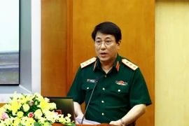 Thượng tướng Lương Cường, Bí thư Trung ương Đảng, Ủy viên Thường vụ Quân ủy Trung ương, Chủ nhiệm Tổng cục Chính trị Quân đội Nhân dân Việt Nam phát biểu tại hội nghị. (Ảnh: An Đăng/TTXVN)