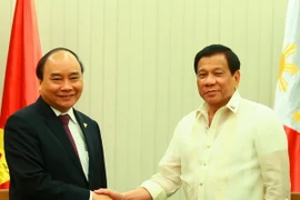 Thủ tướng Nguyễn Xuân Phúc gặp Tổng thống Philippines Rodrigo Roa Duterte. (Ảnh: Thống Nhất/TTXVN)