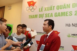 Xạ thủ Hoàng Xuân Vinh - niềm hy vọng của thể thao Việt Nam tại SEA Games 29. (Ảnh: Quốc Khánh/TTXVN)