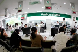 Duy trì ổn định lãi suất ngân hàng đang chịu nhiều áp lực