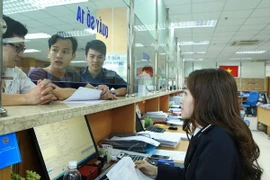 Doanh nghiệp mở tờ khai hàng hóa xuất nhập khẩu tại Chi cục Hải quan cửa khẩu Sân bay quốc tế Nội Bài thuộc Cục Hải quan Hà Nội. (Ảnh: Hoàng Hùng/TTXVN)