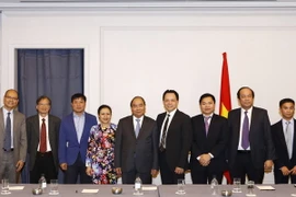 Thủ tướng Nguyễn Xuân Phúc với các đại biểu. (Ảnh: Thống Nhất/TTXVN)