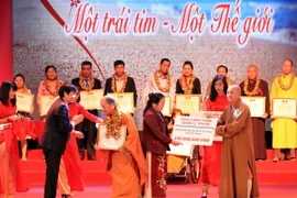 Các đơn vị, mạnh thường quân ủng hộ Chương trình. (Ảnh: Anh Tuấn/TTXVN)