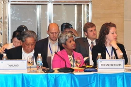 Đại biểu Hoa Kỳ và Thái Lan tham dự phiên họp Đối tác chính sách về An ninh lương thực. (Ảnh: Nguyễn Khang/TTXVN)