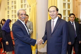 Chủ tịch nước Trần Đại Quang tiếp ông Gholam Hossein Shafei, Chủ tịch Phòng Thương mại, Công nghiệp, Mỏ và Nông nghiệp Iran. (Ảnh: Nhan Sáng/TTXVN)