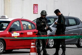 Cảnh sát Malaysia tham gia cuộc diễn tập an ninh tại Kuala Lumpur. (Ảnh: EPA/TTXVN)