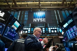 Một phiên giao dịch tại Sàn giao dịch chứng khoán New York, Mỹ. (Ảnh: AFP/TTXVN)