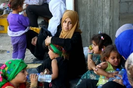 Người dân Syria. (Ảnh: AFP/TTXVN)