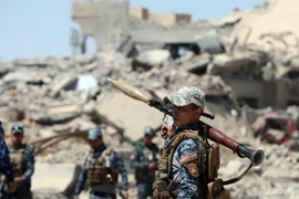 Binh sỹ Iraq làm nhiệm vụ trong chiến dịch chống IS. (Ảnh: AFP/TTXVN)