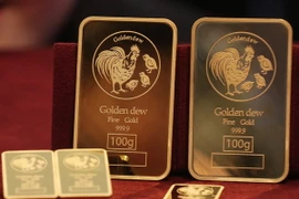 Vàng miếng được bày tại cửa hàng Lotte ở Seoul, Hàn Quốc. (ẢNh: YONHAP/TTXVN)