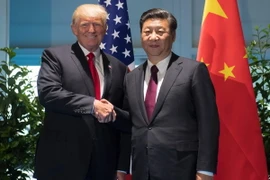 Chủ tịch Trung Quốc Tập Cận Bình và Tổng thống Mỹ Donald Trump. (Ảnh: AFP/TTXVN)