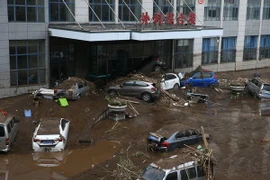 Cảnh ngập lụt sau những trận mưa lớn. (Ảnh: AFP/TTXVN)