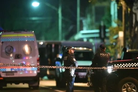 Cảnh sát Australia trong chiến dịch truy quét khủng bố tại Sydney ngày 29/7 vừa qua. (Ảnh: AFP/TTXVN)