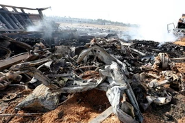 Hiện trường vụ đánh bom ở phía nam thủ đô Baghdad ngày 30/3 vừa qua. (Ảnh: EPA/TTXVN)