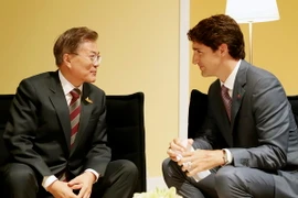 Thủ tướng Canada Justin Trudeau và Tổng thống Hàn Quốc Moon Jae-in. (Ảnh: EPA/TTXVN)