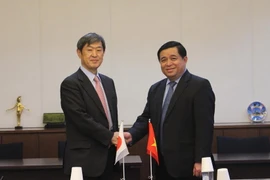 Bộ trường Bộ Kế hoạch đầu tư Nguyễn Chí Dũng tiếp Cơ quan hợp tác quốc tế Nhật Bản Kitaoka Shinichi. (Ảnh: Nguyễn Tuyến/Vietnam+)