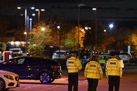 Cảnh sát làm nhiệm vụ tại hiện trường vụ bắt giữ con tin. (Nguồn: AFP/TTXVN)