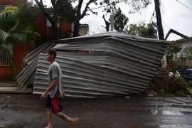 Cảnh đổ nát sau bão Maria tại San Juan, Puerto Rico ngày 20/9.(Nguồn: AFP/TTXVN)