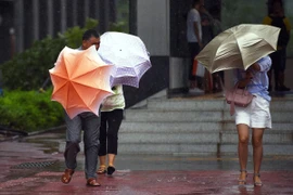 Mưa to gió lớn khi bão Pakhar quét qua tỉnh Quảng Đông, Trung Quốc ngày 27/8. (Nguồn: THX/TTXVN)