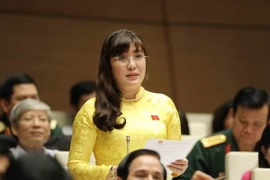 Đại biểu Quốc hội thành phố Đà Nẵng Võ Thị Như Hoa chất vấn. (Ảnh: Phương Hoa/TTXVN)