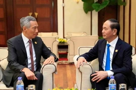 Chủ tịch nước Trần Đại Quang và Thủ tướng Singapore Lý Hiển Long. (Ảnh: TTXVN)