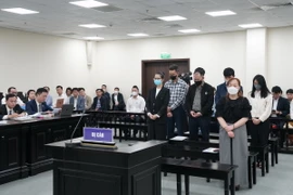 Các bị cáo tại phiên tòa hôm 9/4. (Ảnh: Kim Anh/TTXVN)