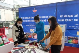 Các doanh nghiệp tham gia phải đáp ứng các tiêu chí từng giai đoạn từ quá trình sản xuất, sản phẩm, hàng hóa, hệ thống phân phối. (Ảnh: Xuân Quảng/Vietnam+)