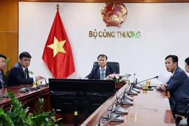 Thứ trưởng Đỗ Thắng Hải tham dự trực tuyến Lễ khai mạc Hội chợ Xuất nhập khẩu Trung Quốc lần thứ 130 và Diễn đàn thương mại quốc tế Châu Giang 2021. (Ảnh: Đức Duy/vietnam+)