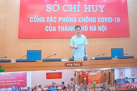 Ông Hà Minh Hải, Phó Chủ tịch UBND thành phố Hà Nội họp với các quận, huyện về công tác phòng chống dịch bệnh. (Ảnh: PV/Vietnam+)