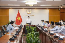 Bộ trưởng Bộ Công Thương Nguyễn Hồng Diên làm việc trực tuyến với Bắc Giang về sản xuất và tiêu thụ nông sản. (Ảnh: PV/Vietnam+)