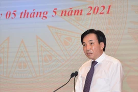 Bộ trưởng, Chủ nhiệm Văn phòng Chính phủ chủ trì phiên họp báo tối 5/5. (Ảnh: Đức Duy/Vietnam+)