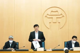 Bộ trưởng Y tế Nguyễn Thanh Long đề nghị Hà Nội phải vừa truy vết vừa khoanh vùng, lấy mẫu triệt để các trường hợp tiếp xúc. (Ảnh: PV/Vietnam+)