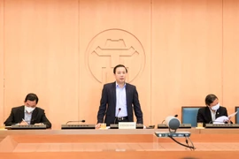 Phó Chủ tịch Ủy ban nhân dân thành phố Hà Nội Chử Xuân Dũng, chủ trì cuộc họp của Ban chỉ đạo phòng chống dịch bệnh COVID-19. (Ảnh: PV/Vietnam+)