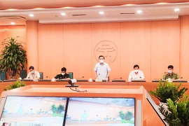 Cuộc họp của Ban Chỉ đạo phòng chống dịch bệnh COVID-19 thành phố Hà Nội. (Ảnh: PV/Vietnam+)