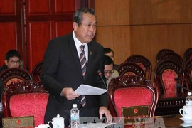 Chánh án Tòa án nhân dân tối cao Trương Hòa Bình trình bày Tờ trình về việc cử Thẩm phán Tòa án nhân dân tối cao làm thành viên Hội đồng thẩm phán Tòa án nhân dân tối cao. Ảnh: Phương Hoa - TTXVN