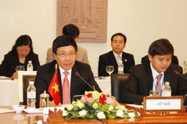 Phó Thủ tướng, Bộ trưởng Ngoại giao Việt Nam Phạm Bình Minh đồng chủ trì Kỳ họp lần thứ 13 Ủy ban hỗn hợp Việt Nam-Campuchia về hợp tác kinh tế, văn hóa, khoa học và kỹ thuật. (Ảnh: Xuân Khu/Vietnam+)