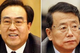 Quan chức Đỗ Thiện Học (trái) và Lệnh Chính Sách. (Nguồn: Xinhua)