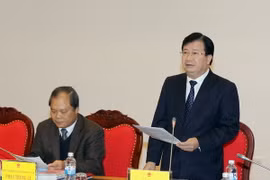 Bộ trưởng Bộ Xây dựng Trịnh Đình Dũng phát biểu tại phiên họp. (Ảnh: An Đăng/TTXVN)