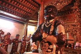 Pho tượng đồng Huyền Thiên Trấn Vũ được công nhận là Bảo vật quốc gia ngày 25/12/2015. (Ảnh: Minh Quyết/TTXVN)