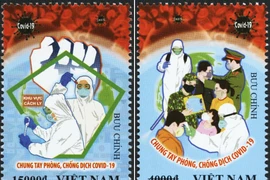 Hai mẫu của bộ tem 'Chung tay phòng, chống dịch Covid-19'. (Ảnh: Bưu điện Việt Nam)