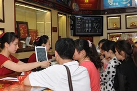 Giao dịch tại Bảo tín Minh Châu. (Nguồn: BTMC).