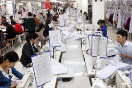 Sản xuất dệt may. (Nguồn: TTXVN).