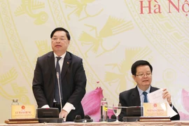 Ông Lê Mạnh Hùng, Phó Trưởng Ban Tuyên giáo Trung ương, Giám đốc Trung tâm báo chí Đại hội XIII của Đảng phát biểu. (Ảnh: Phương Hoa/TTXVN)